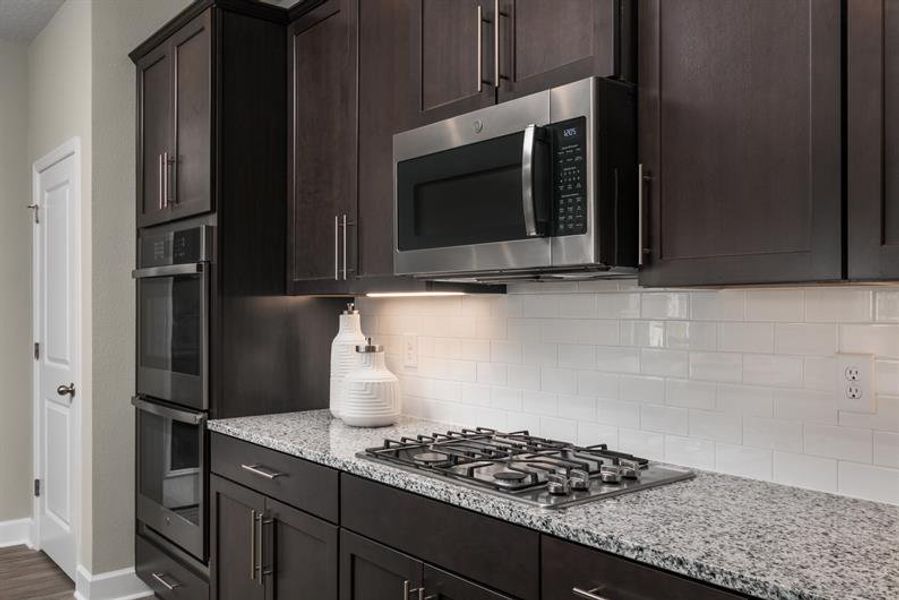 Representative furnished interior of a home built from the Hutchinson by Ryan Homes in Lake Mattie Preserve Single-Family, Auburndale (Image 5). Representative furnished interior of a home built from the Hutchinson by Ryan Homes in Lake Mattie Preserve Single-Family, Auburndale (Image 5).