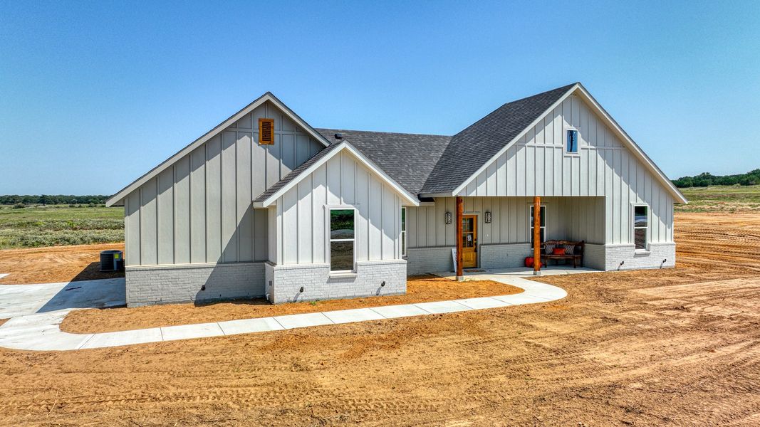 Representative exterior photo of a completed home built from the Loretta by Zeal Home Builders in Parallel Pastures, Poolville, TX (Image 2).
