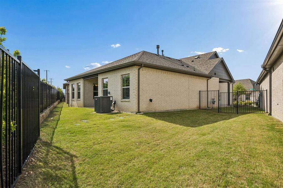 Exterior details and patio area of a home in , Rockwall (Image 25). Exterior details and patio area of a home in , Rockwall (Image 25).