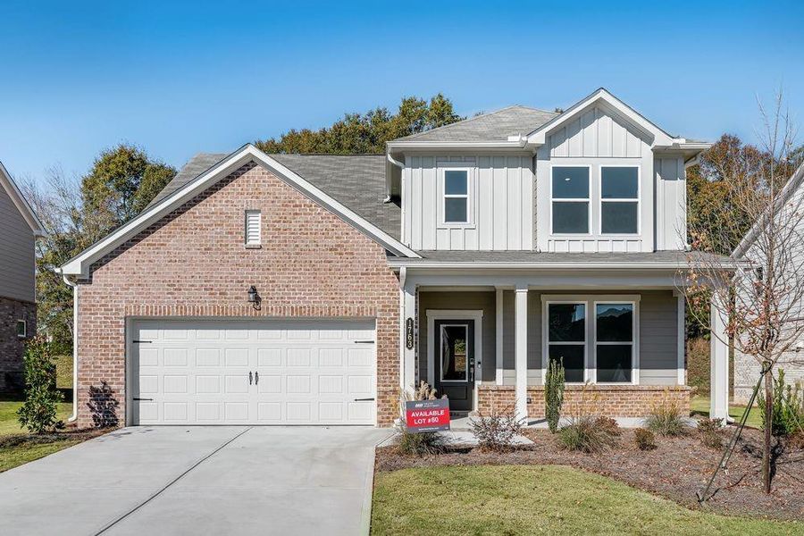 Front exterior of a new home in Windance Lake, Loganville, GA, highlighting curb appeal (Image 1).