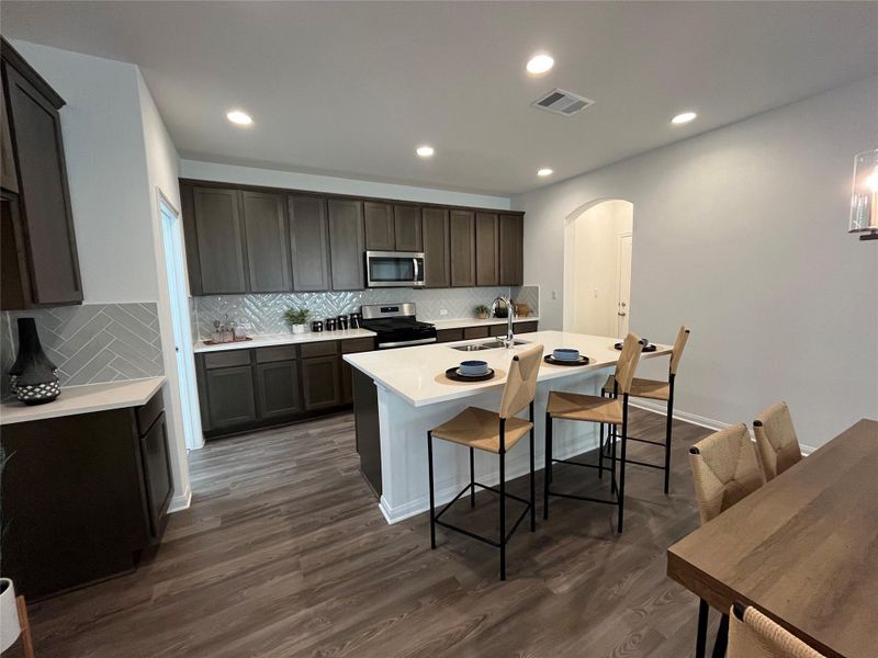 Furnished interior view inside a new home in Wellspring, Round Rock (Image 5).