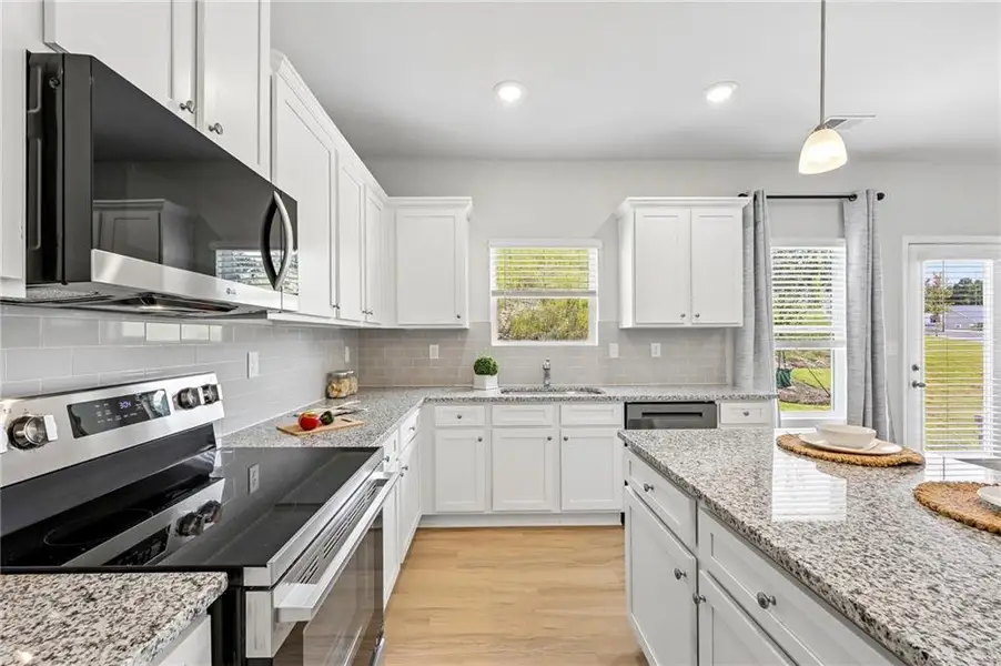 Furnished interior view inside a new home in The Hills at Cedar Creek, Winder (Image 26).