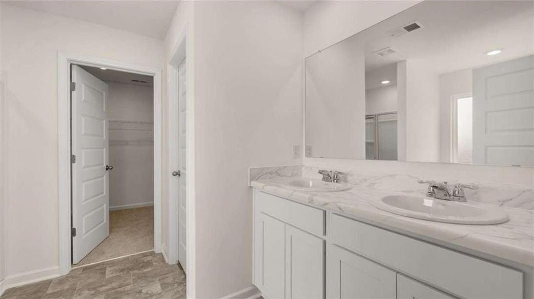 Furnished interior view inside a new home in Oakchase at Hampton, Hampton (Image 6). Furnished interior view inside a new home in Oakchase at Hampton, Hampton (Image 6).