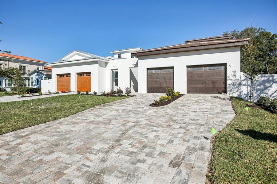 Front exterior of a new home in , St. Petersburg, FL, highlighting curb appeal (Image 27). Front exterior of a new home in , St. Petersburg, FL, highlighting curb appeal (Image 27).