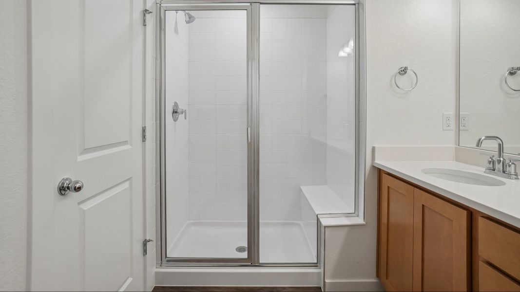 Primary bathroom with dual vanity and quality finishes. Primary bathroom with dual vanity and quality finishes.