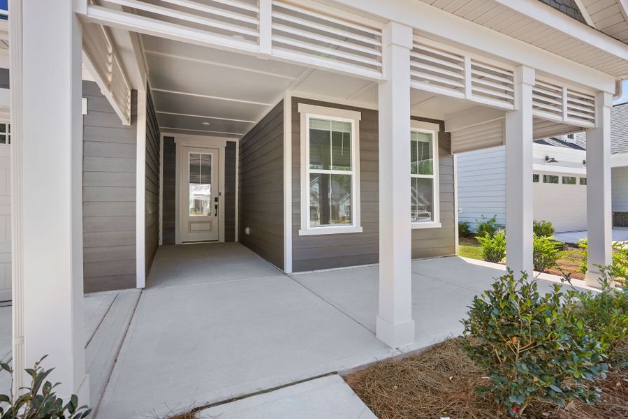 Exterior details and patio area of a home in Carolina Riverside, Belmont (Image 4).