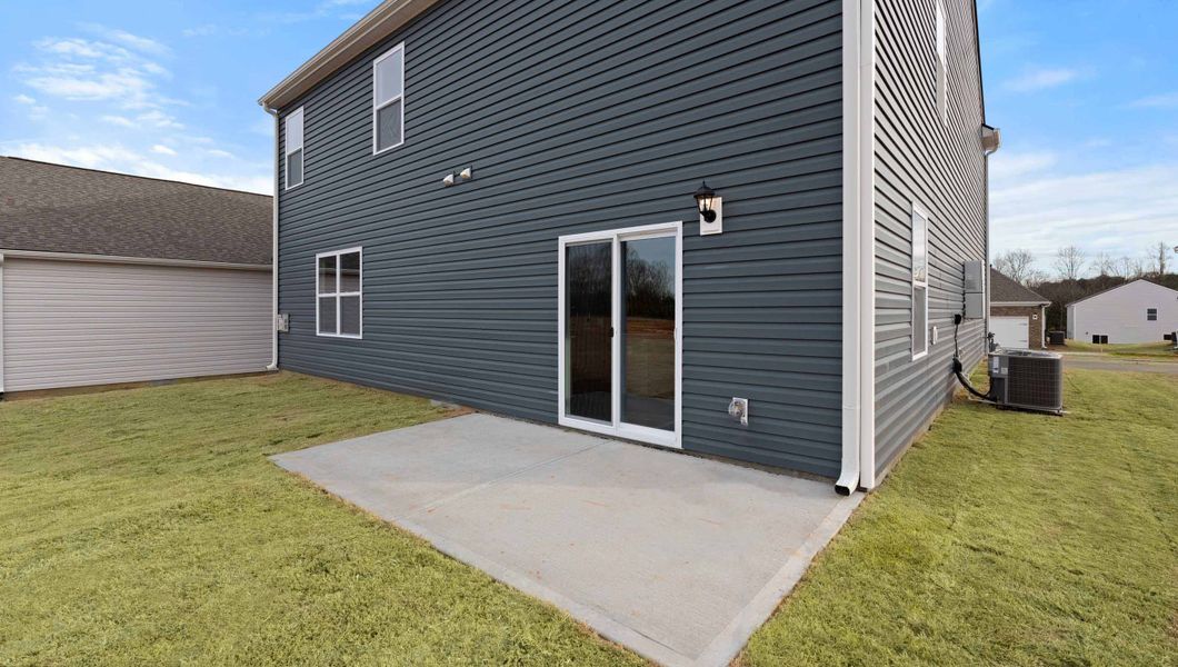 Exterior details and patio area of a home in Durbin Meadows Traditions, Fountain Inn (Image 2). Exterior details and patio area of a home in Durbin Meadows Traditions, Fountain Inn (Image 2).