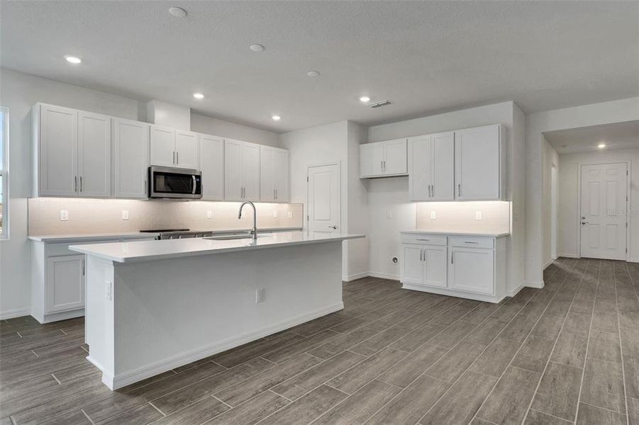 Furnished interior view inside a new home in Tuscan Hills, Dade City (Image 14).