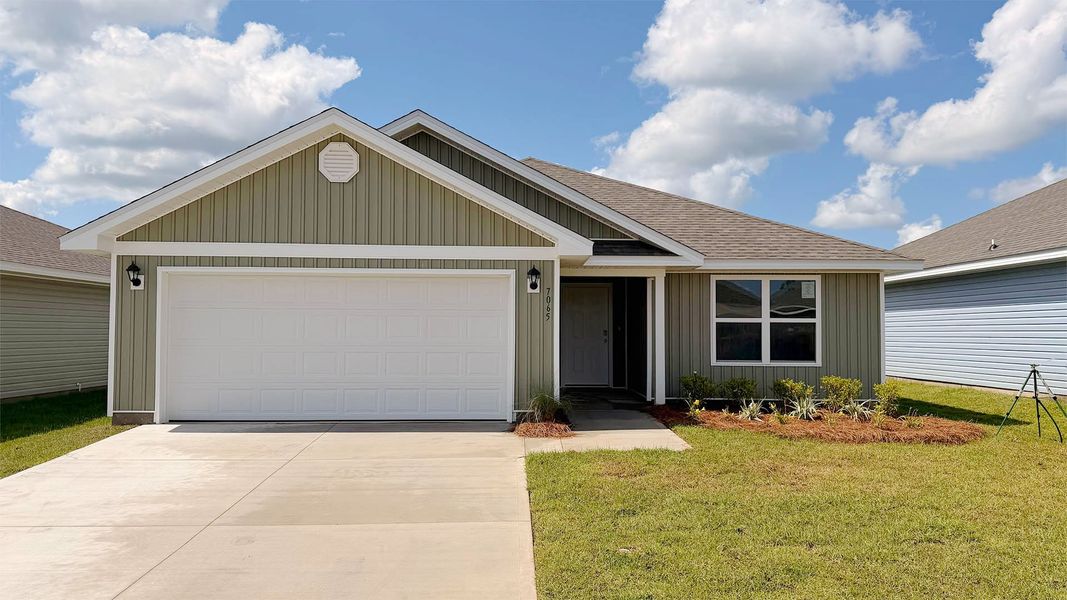 Front exterior of a new home in Liberty, Panama City, FL, highlighting curb appeal (Image 1). Front exterior of a new home in Liberty, Panama City, FL, highlighting curb appeal (Image 1).