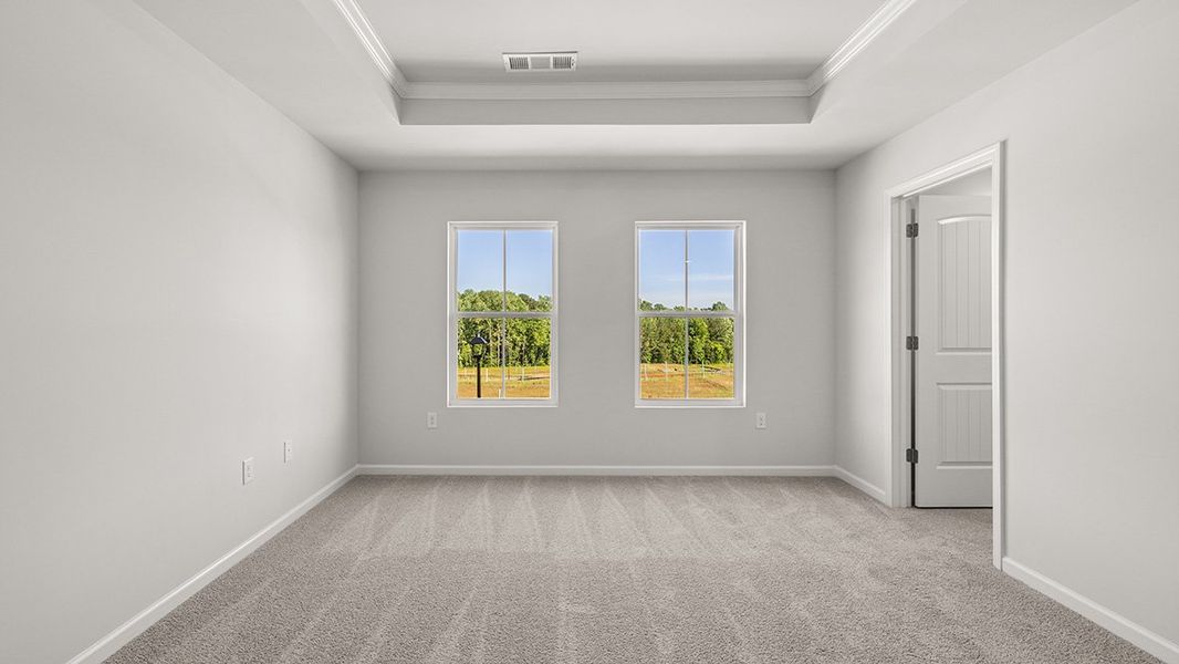 Representative unfurnished interior of a home built from the AMESBURY by D.R. Horton in Waypoint, Flowery Branch (Image 17).