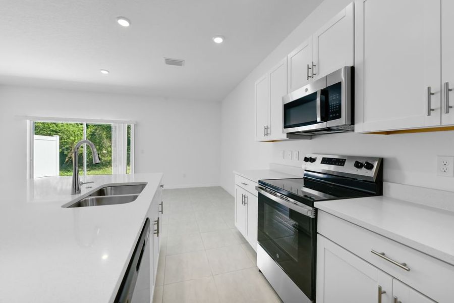 Furnished interior view inside a new home in Vinterra Townhomes, Nokomis (Image 8).