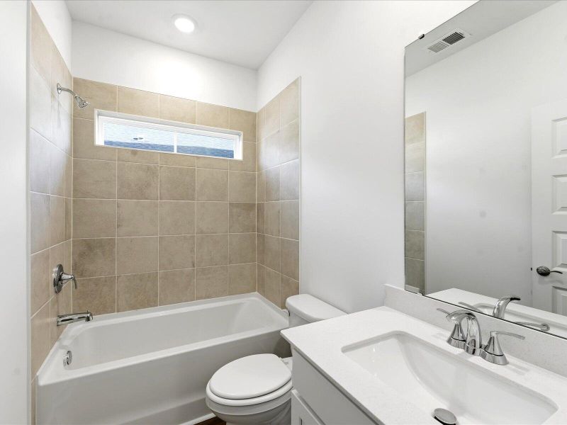 Furnished interior view inside a new home in The Coves at Lakes of Cane Bay II, Summerville (Image 4).