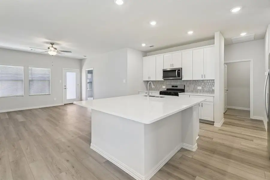 Photo is not of the actual home, but is an inspirational photo of builder’s model home and may depict options, furnishings, and/or decorator features that are not included.