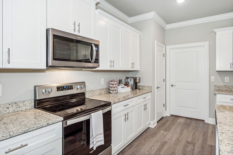 Representative furnished interior of a home built from the The Turquoise by Herbst Homes in Walther Reserve, Milton (Image 13).
