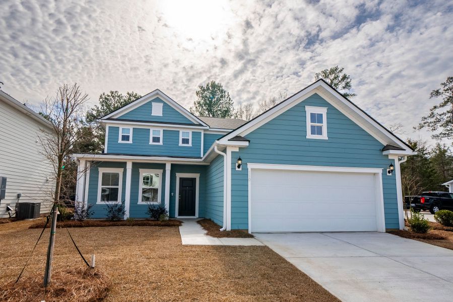 Front exterior of a new home in Monroe Preserve, Chapin, SC, highlighting curb appeal (Image 27).