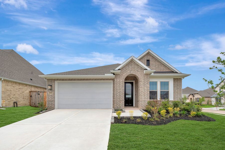 Front exterior of a new home in Escondido - Retreat Collection, Magnolia, TX, highlighting curb appeal (Image 23). Front exterior of a new home in Escondido - Retreat Collection, Magnolia, TX, highlighting curb appeal (Image 23).