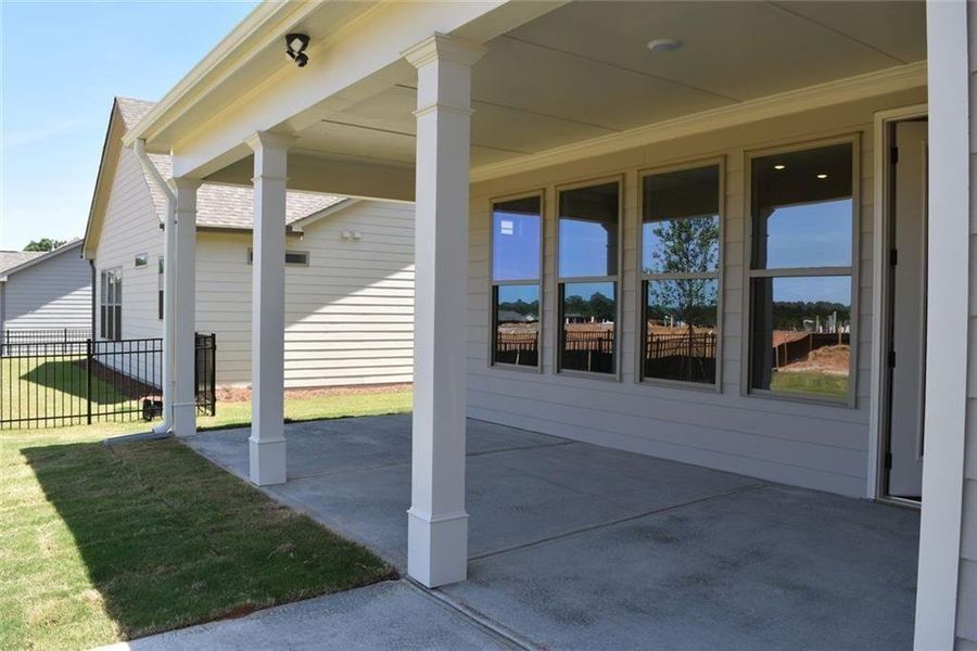 Exterior details and patio area of a home in Soleil Summit Chase, Snellville (Image 3). Exterior details and patio area of a home in Soleil Summit Chase, Snellville (Image 3).