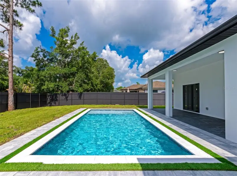 Exterior details and patio area of a home in , North Port (Image 23).