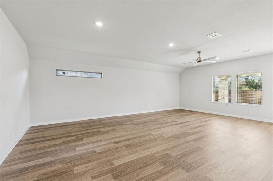 Living and Dining Rooms in the Oscar home plan by Trophy Signature Homes – REPRESENTATIVE PHOTO