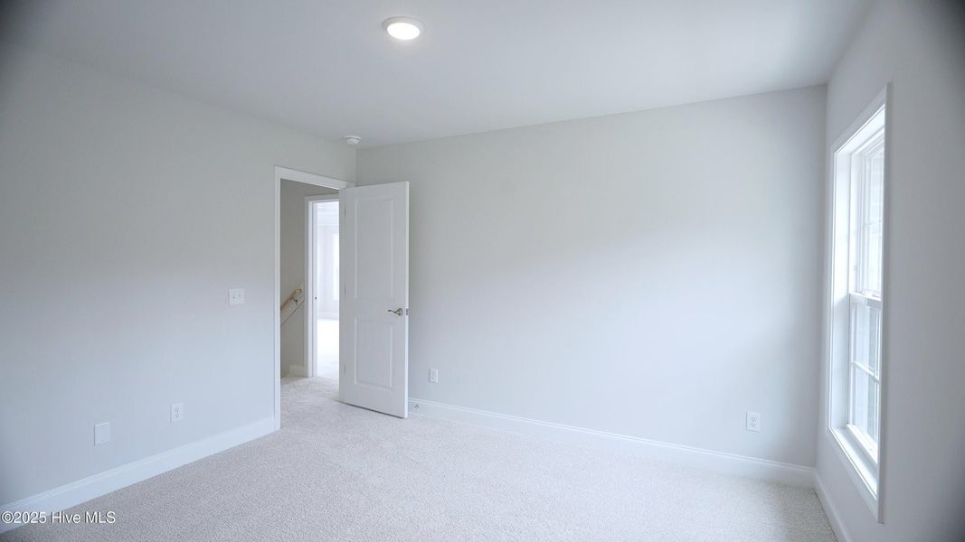 Spacious, unfurnished interior of a new home in Palmetto Creek, Bolivia (Image 21).