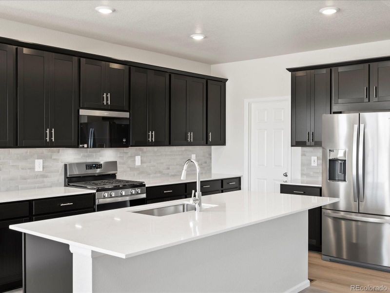 Furnished interior view inside a new home in Poudre Heights: The Alpine Collection, Windsor (Image 12).