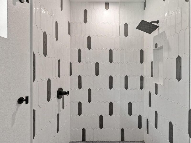 Bathroom with tiled shower