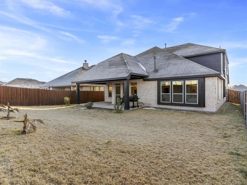 Exterior details and patio area of a home in Star Ranch, Godley (Image 32).