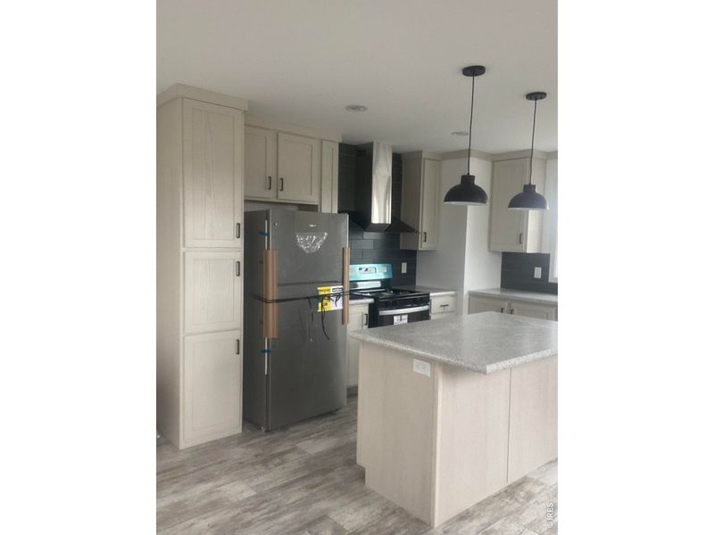 Furnished interior view inside a new home in , Carr (Image 4).