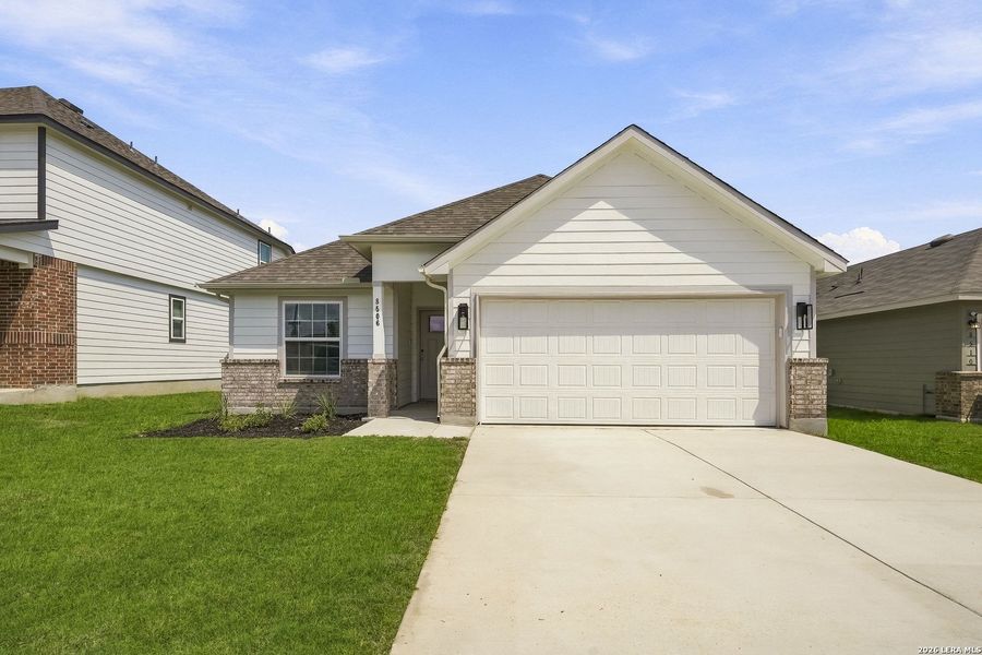 Front exterior of a new home in Cinco Lakes, San Antonio, TX, highlighting curb appeal (Image 2). Front exterior of a new home in Cinco Lakes, San Antonio, TX, highlighting curb appeal (Image 2).