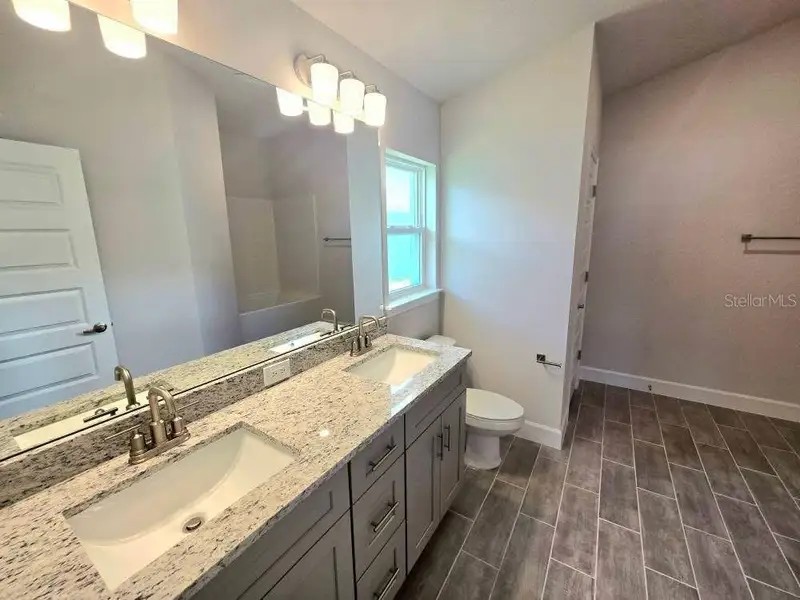 Furnished interior view inside a new home in Watercress Cove, North Port (Image 5). Furnished interior view inside a new home in Watercress Cove, North Port (Image 5).