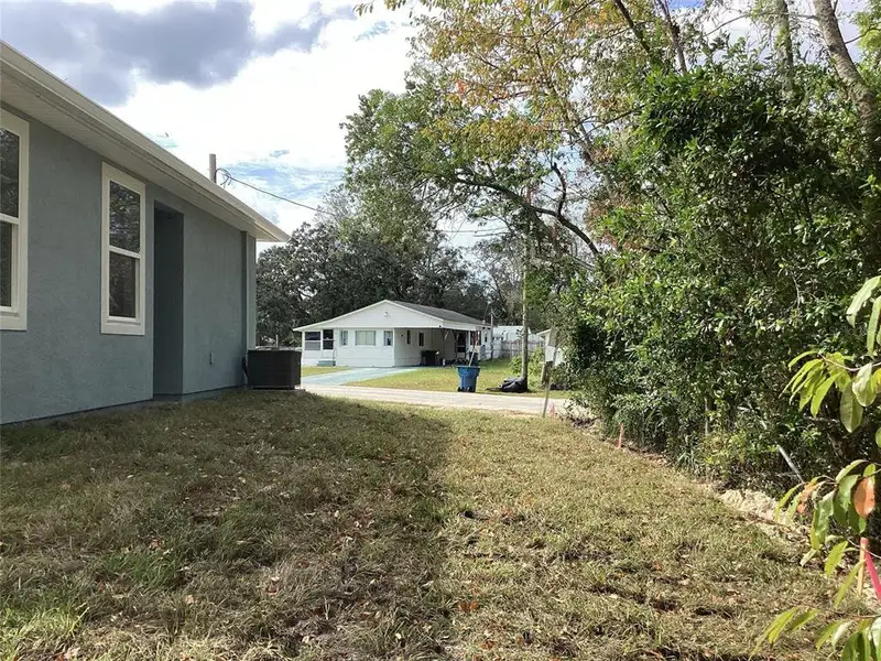 Exterior details and patio area of a home in , Spring Hill (Image 3).