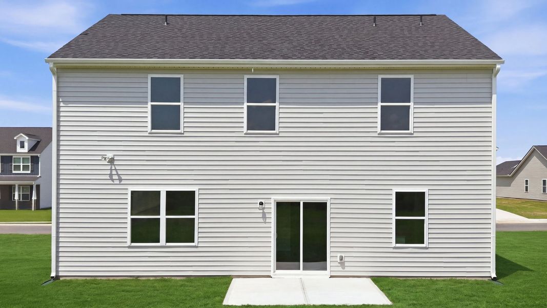 Exterior details and patio area of a home in East Ridge, Ayden (Image 20).