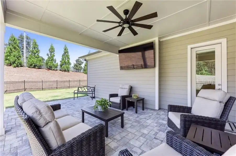 Exterior details and patio area of a home in The Retreat at Sterling on the Lake 48', Flowery Branch (Image 28).
