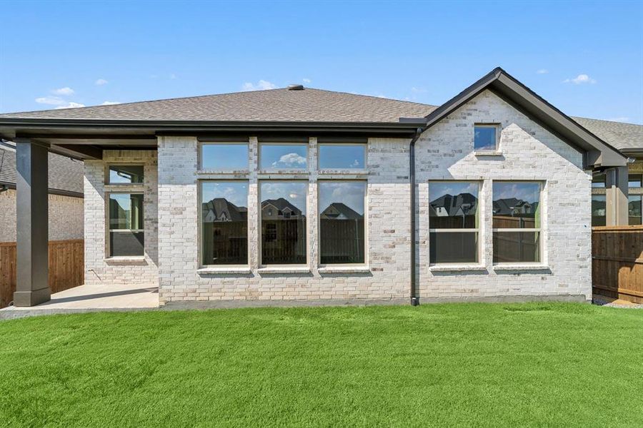 Exterior details and patio area of a home in Sandbrock Ranch, Aubrey (Image 2). Exterior details and patio area of a home in Sandbrock Ranch, Aubrey (Image 2).