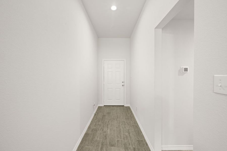 Front exterior of a new home in Mountain Valley, Burleson, TX, highlighting curb appeal (Image 6).