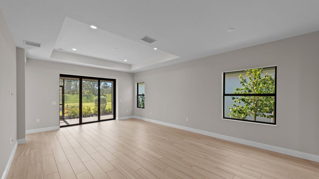 Spacious, unfurnished interior of a new home in SkySail, Naples (Image 21).