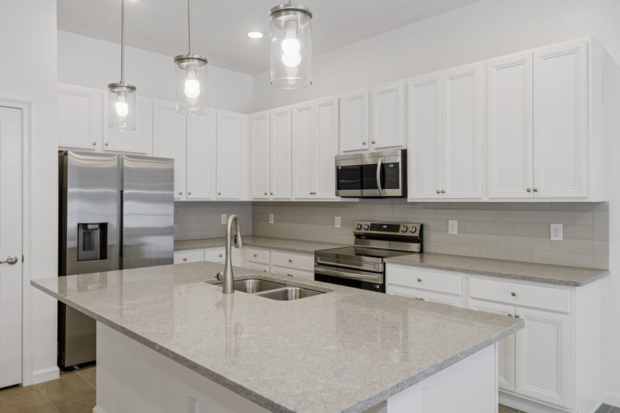 Representative furnished interior of a home built from the Aquamarine by Park Square Residential in Paradiso Grande, Orlando (Image 5).