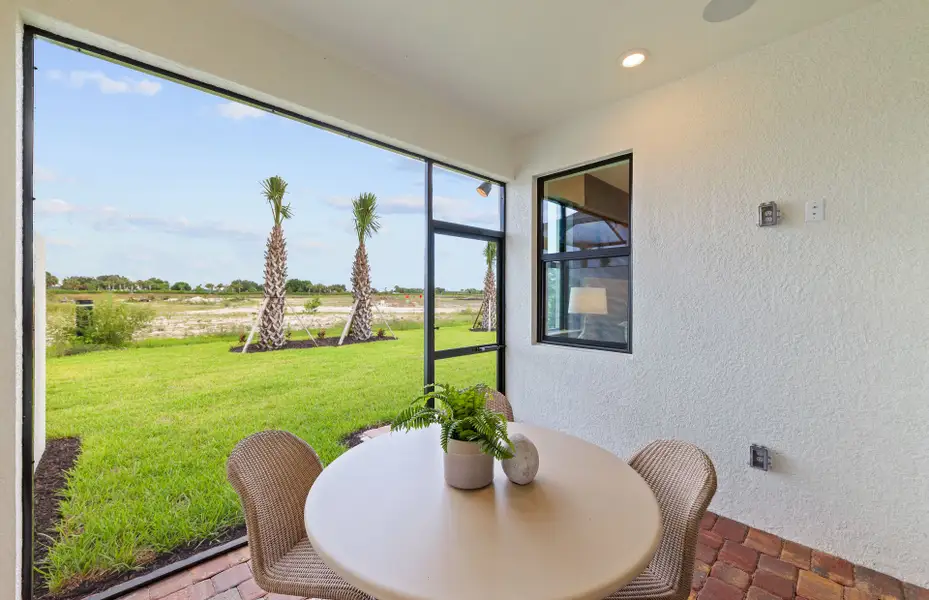 Exterior details and patio area of a home in Del Webb Naples, Ave Maria (Image 4).