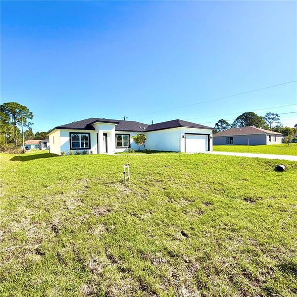 Exterior details and patio area of a home in , Palm Bay (Image 31).