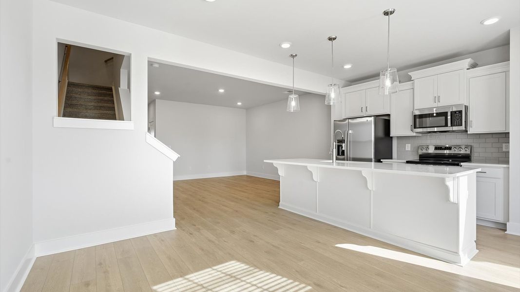 A bright breakfast area designed for casual dining and easy morning routines by the reputable DRB Homes