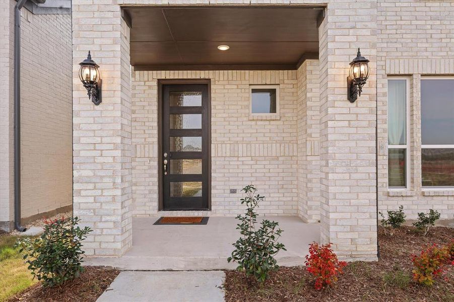 Exterior details and patio area of a home in Symmetry 37s, Frisco (Image 4).