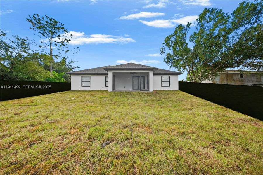 Exterior details and patio area of a home in , Lehigh Acres (Image 24). Exterior details and patio area of a home in , Lehigh Acres (Image 24).