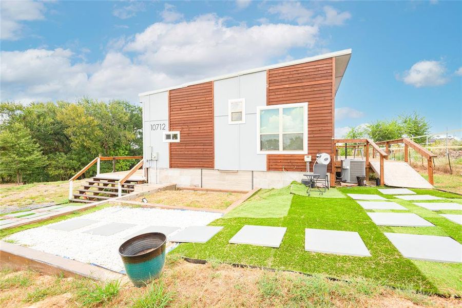 Back of house featuring a patio area Back of house featuring a patio area