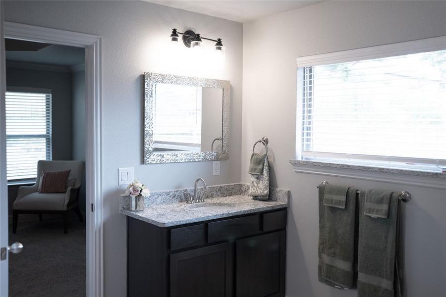 Bathroom featuring vanity