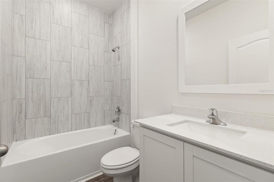 Furnished interior view inside a new home in Peach Crossings, Winter Haven (Image 7).