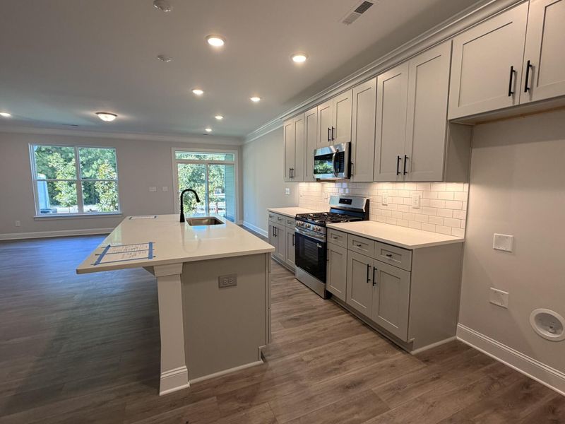 Furnished interior view inside a new home in Harrisburg Village Townhomes, Harrisburg (Image 5).