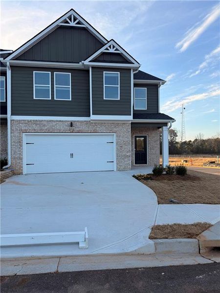 Front exterior of a new home in Carolina, Palmetto, GA, highlighting curb appeal (Image 11).