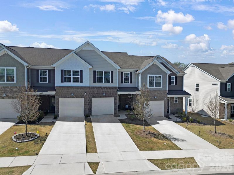 Front exterior of a new home in , Fort Mill, SC, highlighting curb appeal (Image 22).