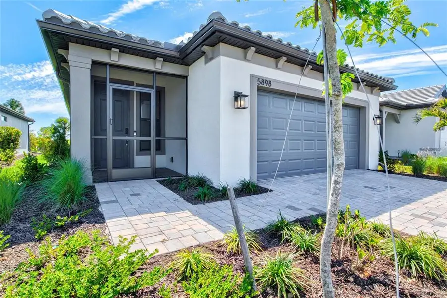 Exterior details and patio area of a home in , Nokomis (Image 3).