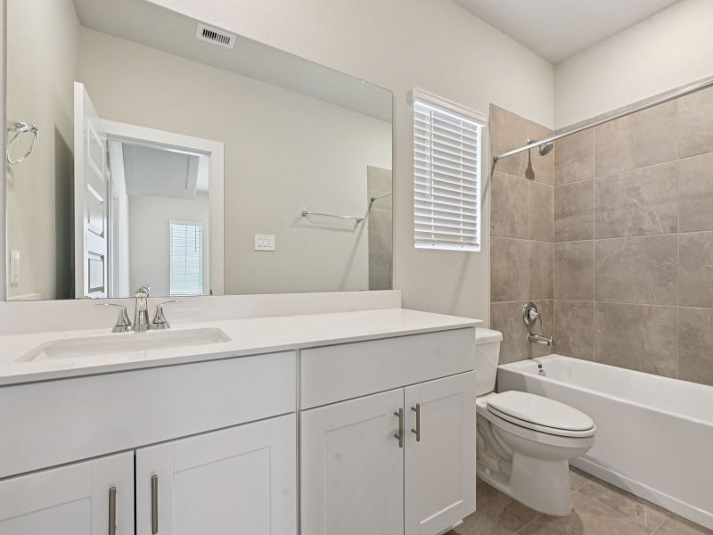 Furnished interior view inside a new home in Pinewood Trails - City Series, Atascocita (Image 17).